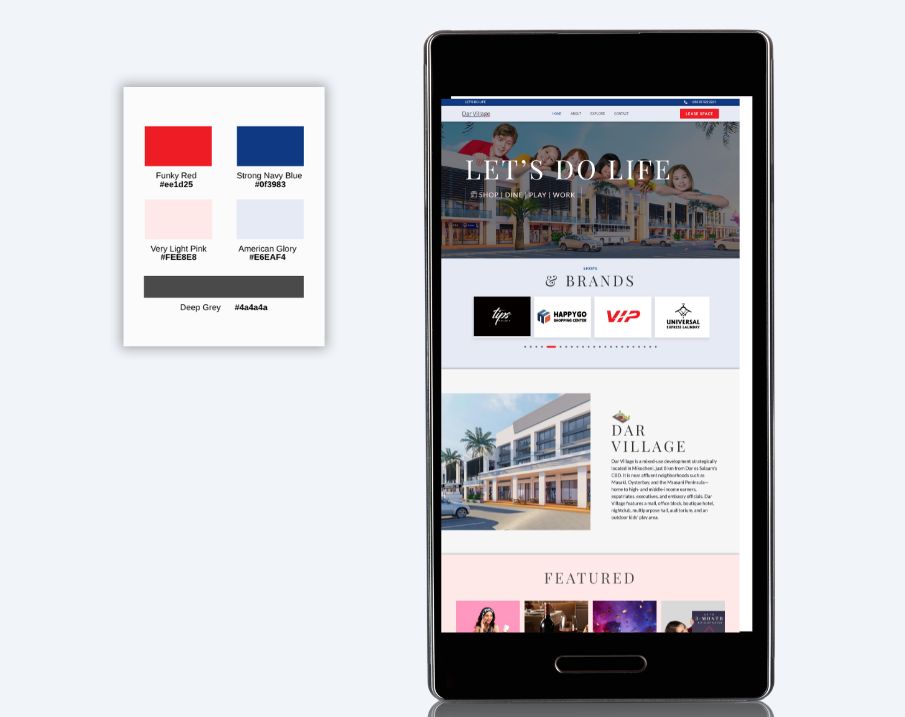 Dar Village brand colors and website viewed on a mobile device